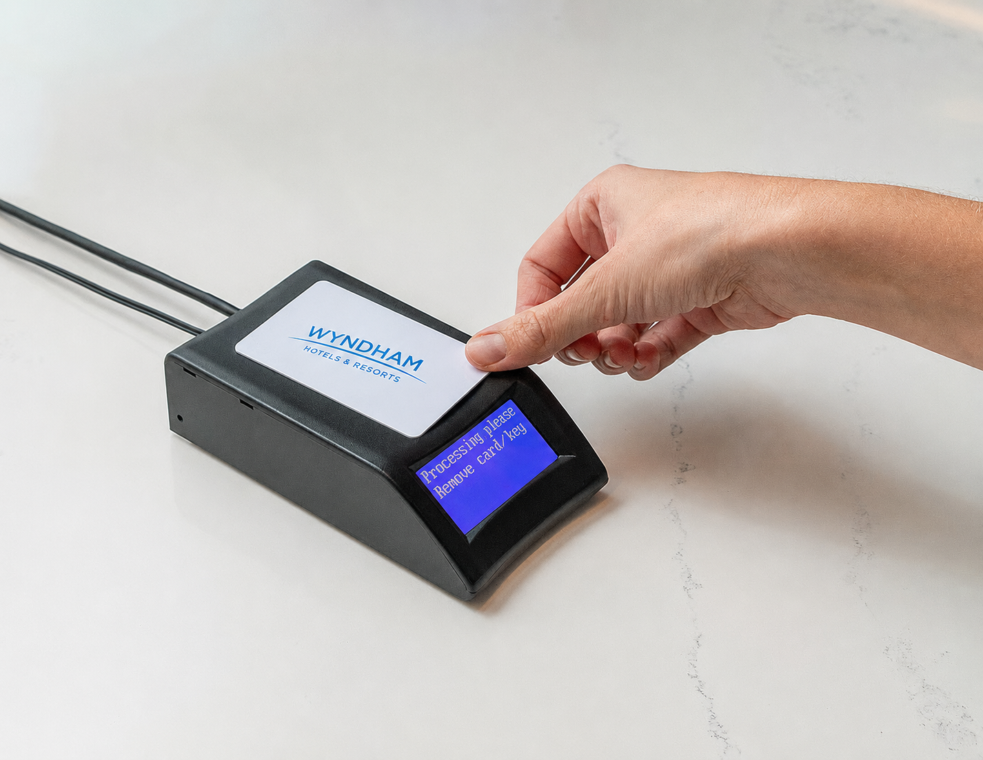 Hold the key card on the encoder